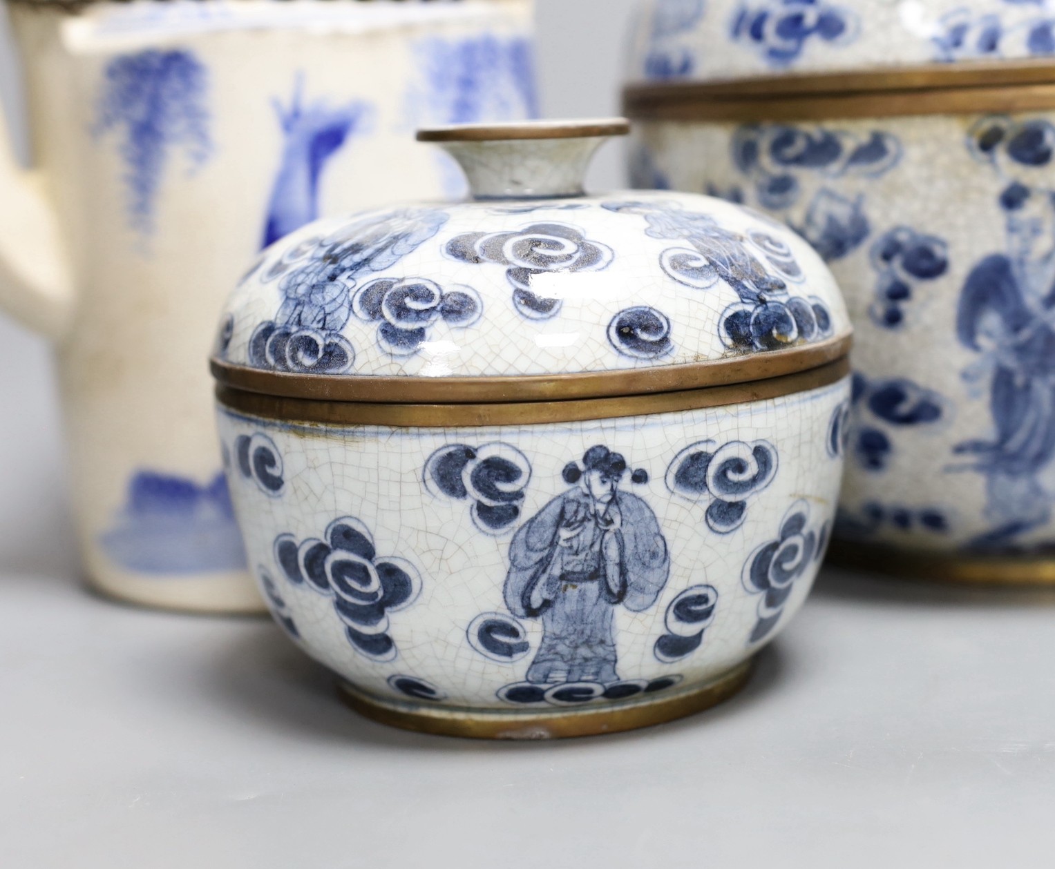 Three Chinese blue and white jars and a teapot, tallest 19cm